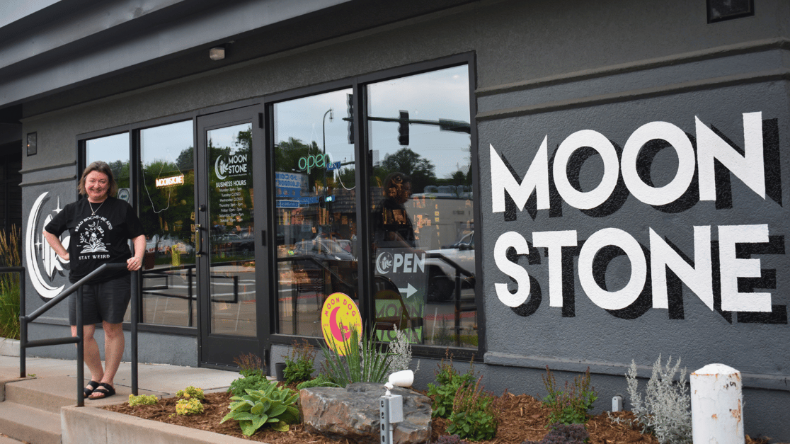 MoonStone MPLS owner Brenna Wernersbach in front of their store